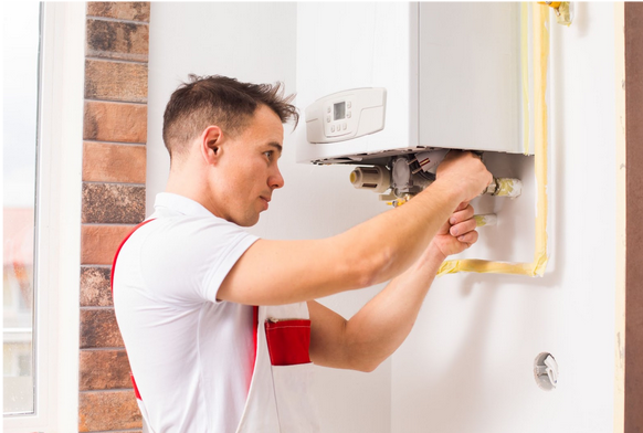 Man fixing boiler